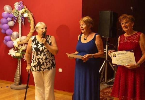 MABS President Presenting Long Service Awards to Two Lady Volunteers