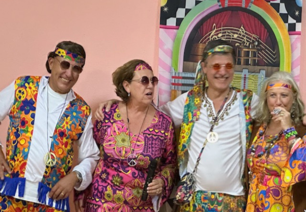 people dressed in classic 60´s attire