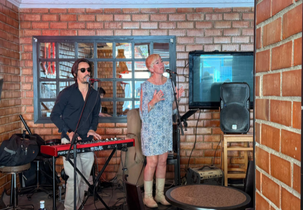 singers singing and playing keyboards